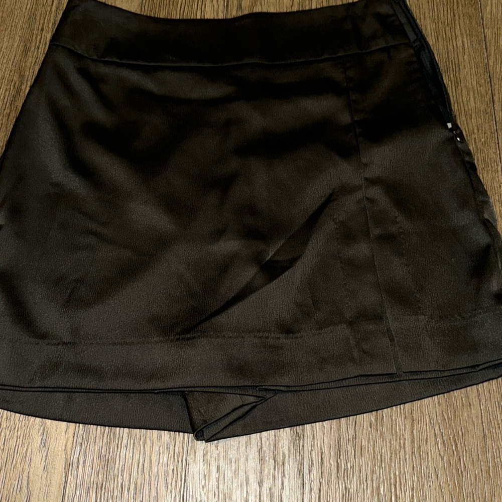 Ladies' size S black skort with tag.